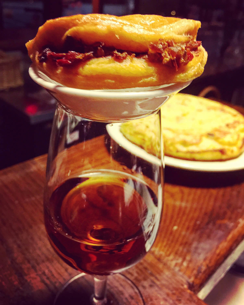 Palo Cortado sherry with miniature empanada at Taberna de Haro - The Spanish Sherry Awakening in America